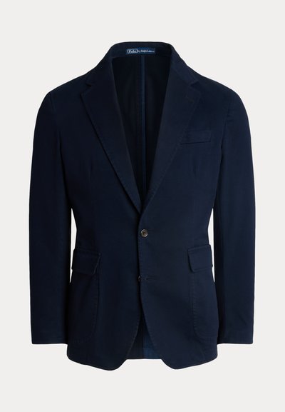 Blazer blu navy in cotone, con revers a lancia, due tasche frontali e chiusura con un solo bottone, dalla texture liscia.