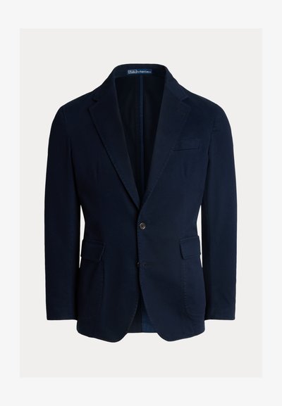 Blazer blu navy in cotone, con revers a lancia, due tasche frontali e chiusura con un solo bottone, dalla texture liscia.