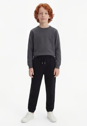 Calvin Klein Jeans RELAXED PINTUCK SWEATPANT UNISEX - Pantalon de survêtement - black