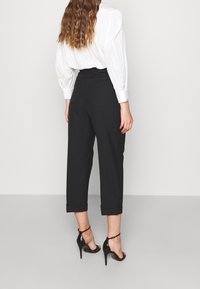 sandro Pantalon classique - black