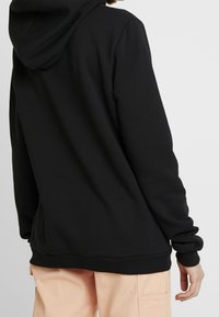 NA-KD Jersey con capucha - black
