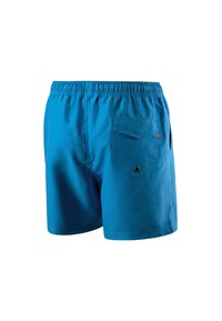 Blauwe zwemshorts met een elastische tailleband, achterzak en een klein logodetail. Gemaakt van lichtgewicht materiaal, met een gladde textuur.