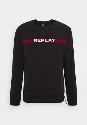 Sudadera negra de algodón con cuello redondo. Presenta el logo "REPLAY" en rojo y blanco en el pecho y bolsillos laterales con cremallera.
