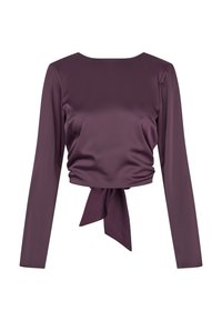 Long-sleeve purple satin top featuring a crew neck and a tied waist detail. Smooth texture with a fitted design, creating a cropped silhouette.