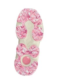 Schuhsohle mit einem rosa-weißen marmorierten Design, strukturiert mit einem Zickzackmuster und einem kreisförmigen Akzent in der Mitte.