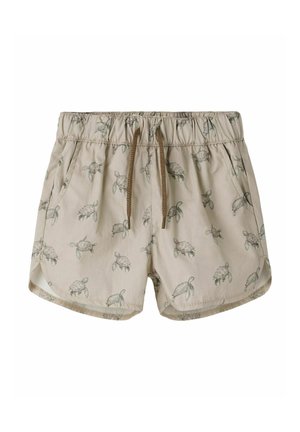 Bézs kisgyermek rövidnadrág elasztikus derékrésszel, barna húzózsinórral, oldalzsebekkel és egész felületén szürke tengeri teknős mintával.