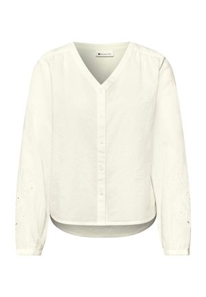 Biała bluzka z długim rękawem, dekoltem w kształcie litery V, zapinana na guziki z przodu, z lekkim bufkowaniem na rękawach oraz subtelnymi haftowanymi detalami na rękawach.