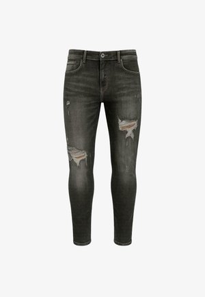 Schwarze enge Jeans mit Rissen an den Oberschenkeln, mittlerer Waschung, klassisches Fünf-Taschen-Design und Metallknopfverschluss.