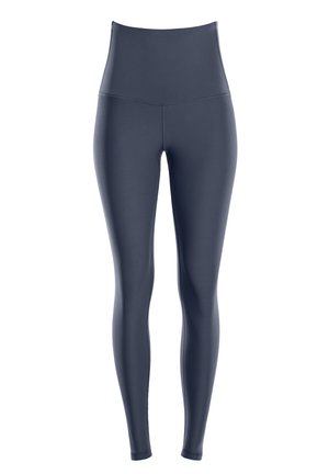 High-waisted navy leggings made of smooth, stretchy fabric. Features a seamless design without pockets, ensuring a sleek silhouette.