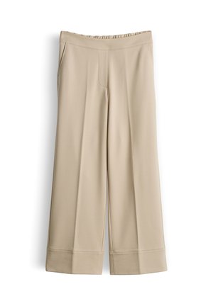 Beige, weit geschnittene Hose mit hohem Bund, seitlichen Taschen, vorderer Nahtverzierung und breiten Bündchen am Saum.