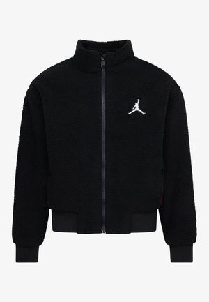 Schwarze Fleecejacke mit durchgehendem Reißverschluss, hohem Kragen, gerippten Bündchen und Saum, mit weißem Jumpman-Logo auf der linken Brust.