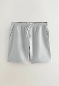 Light gray shorts with a textured, ribbed fabric. Elastic waistband with drawstring, featuring two side pockets.