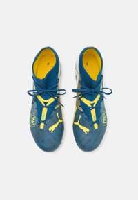 Puma FUTURE 7 MATCH BNA FG/AG - Scarpe da calcio per terreni duri - sailing blue/marine blue/pelé yellow/grassy green/gold