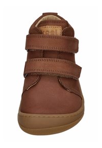 Brown high-top shoe made of synthetic leather with two velcro straps, a textured surface, and a rubber sole for grip.