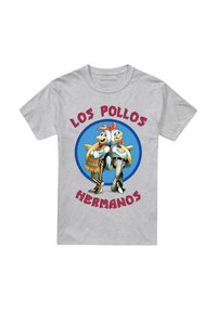 Graues Baumwoll-T-Shirt mit einem zentralen runden Grafikmotiv von zwei Cartoon-Hühnern. Der Text, der oben und unten gewölbt ist, lautet "LOS POLLOS HERMANOS."