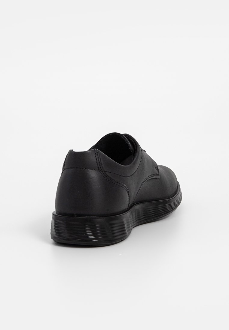 Schwarzes Leder-Schuhwerk mit glatter Oberfläche, abgerundetem Absatz und strukturiertem Gummisohle. Einfaches Design ohne sichtbare Verzierungen.