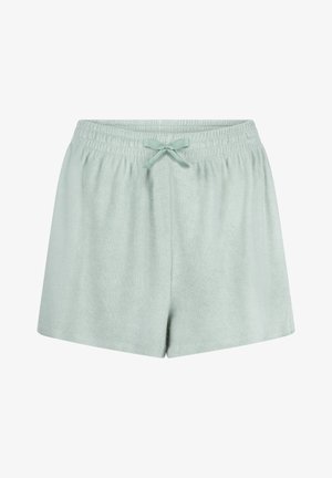 Lichtgroene badstof shorts met elastische tailleband en gestrikt koord aan de voorkant, weergegeven op een witte achtergrond.