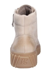Beiga ankelstövlar med texturerad läderöverkonstruktion och dämpad tan gummisula. Har en sidodragkedja för enkel på- och avtagning samt minimala sömdetaljer.
