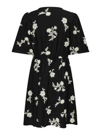 Robe noire longueur genoux avec manches courtes bouffantes, taille cintrée et broderies florales blanches dispersées.
