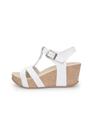 Sandali wedge bianchi con suola in sughero, caratterizzati da un design a T, cinturino regolabile in argento e multiple cinghie orizzontali bianche.