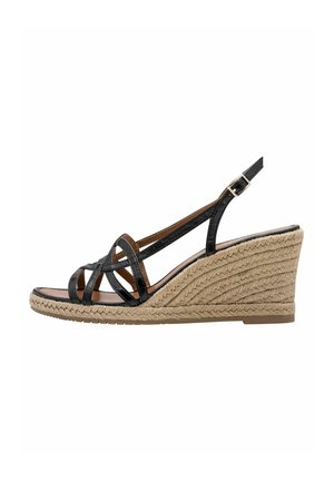 Sandale compensée noire à brides avec talon en jute tressé, tige en cuir lisse, bride de cheville ajustable et semelle en caoutchouc antidérapante.