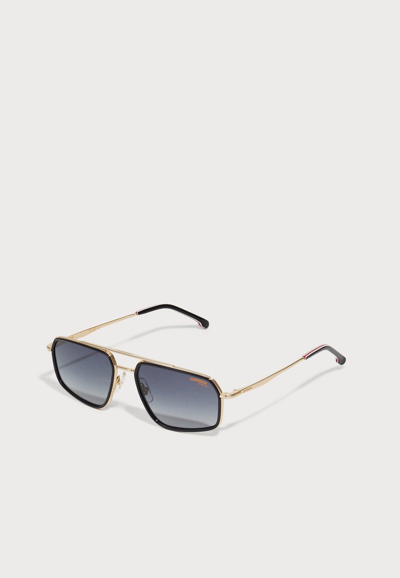 Ochelari de soare cu ramă din metal aurit și lentile negre degrade, cu brațe subțiri ce au accente roșii și negre. Formă rectangulară, design minimalist.