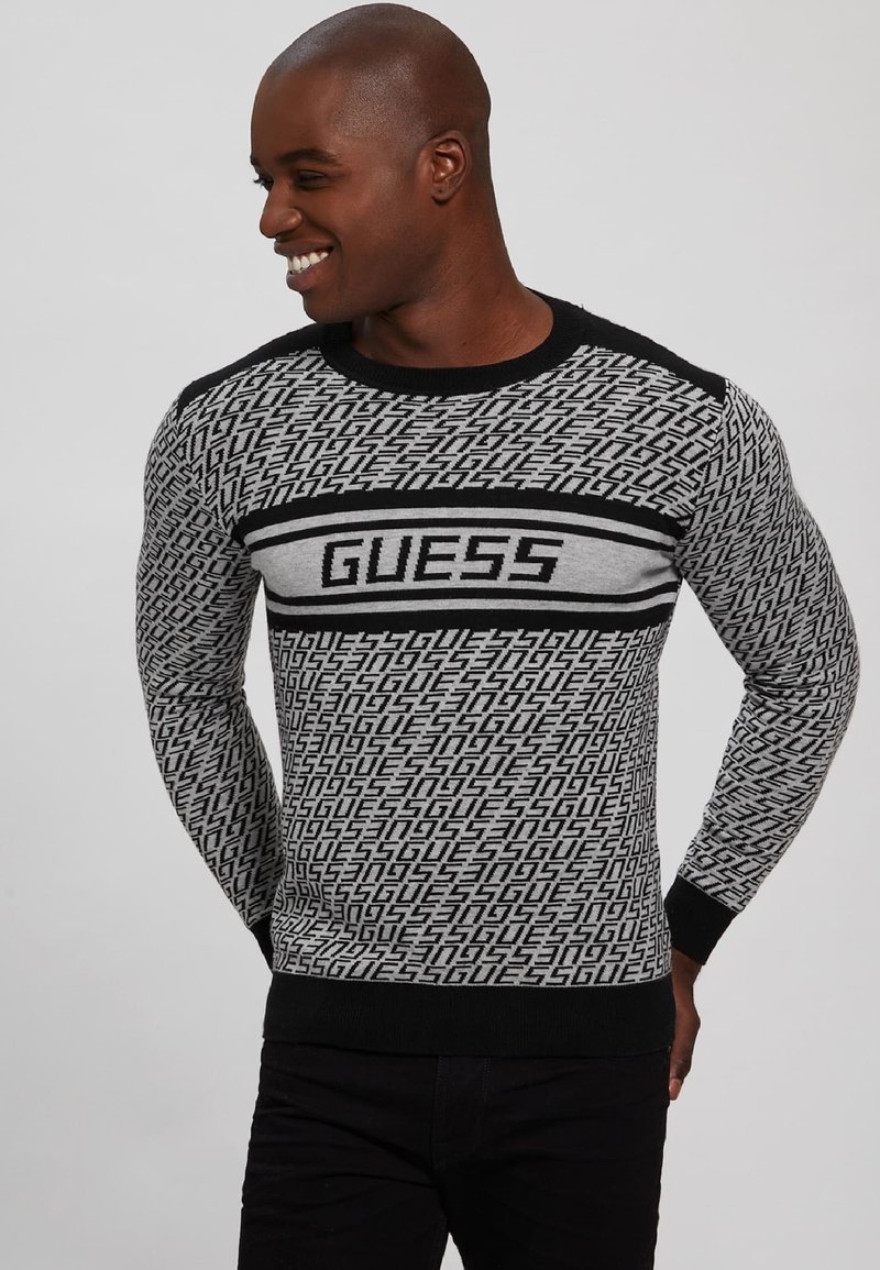 Guess ALLOVERLOGO Jumper schwarz/black Zalando.ie