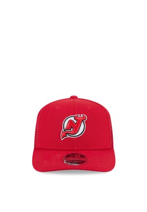 Red snapback cap with New Jersey Devils logo featuring a stylized "NJ" with devil horns and tail on the front panel.