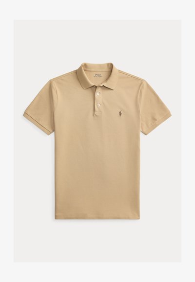 Μπεζ κοντομάνικο πόλο πουκάμισο Polo Ralph Lauren με δύο κουμπιά και κεντημένο λογότυπο αλόγου στο αριστερό στήθος.