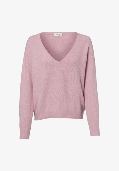Pull rose doux à manches longues avec col en V et texture côtelée, doté d'une coupe décontractée et d'un ourlet légèrement raccourci.