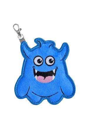 Blue plush monster keychain with embroidered facial features, including large eyes, a smiling mouth, and textured plush material.