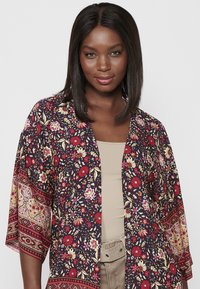 Koroshi Veste légère - red