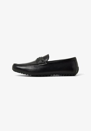 Sorte læder loafers med en vævet detalje på vamps, rund tå og en tekstureret gummisål for godt greb, der viser et slankt, minimalistisk design.