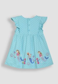 Modré šaty s puntíky a krátkými volantovými rukávy, zapínání na knoflíky na zadní straně, s grafickými motivy mořské panny a mořskými prvky na lemu.