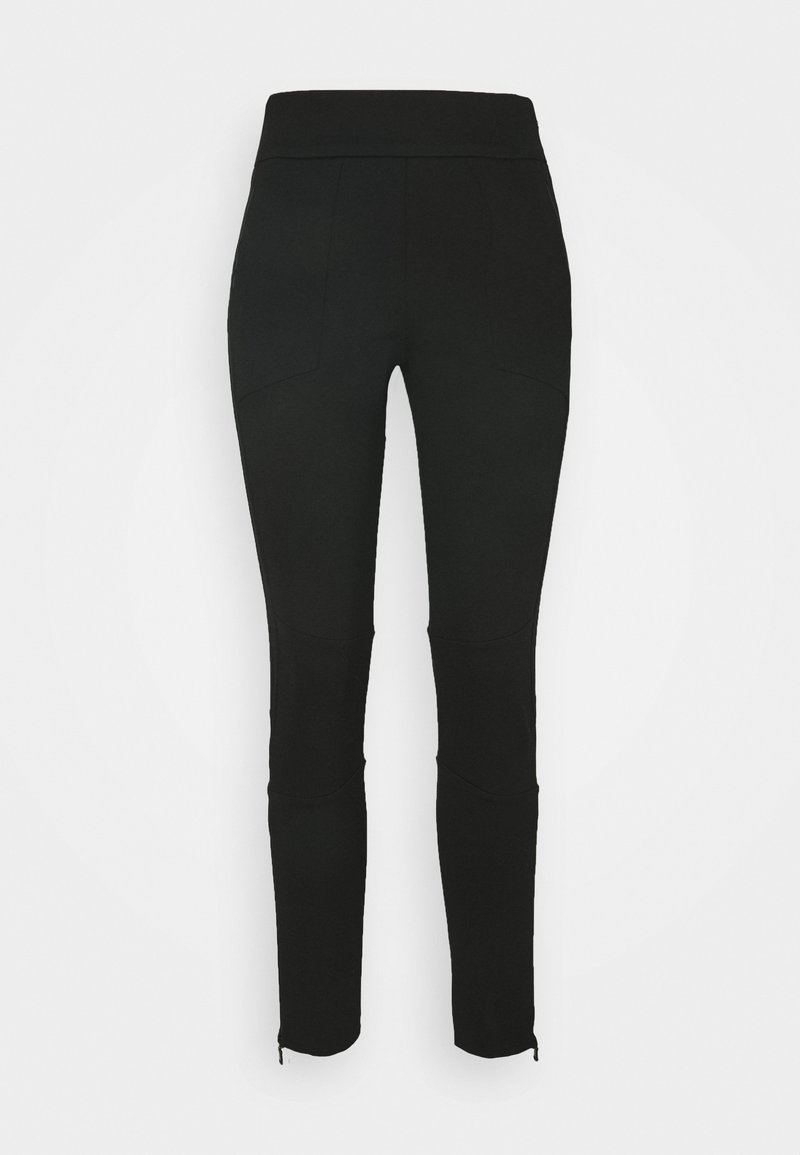 Pantalon noir slim fit avec taille haute et fermetures éclair aux chevilles, conçu avec des détails de coutures sur les genoux et les hanches.