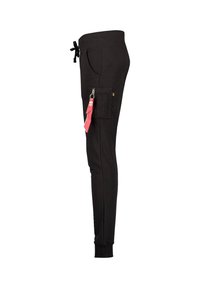Zwarte joggers met een geribde tailleband, ritszak en zijvak. De stof lijkt glad en is aansluitend langs de benen.