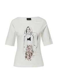 T-shirt blanc à manches courtes présentant une illustration en contour noir d'une femme en blazer et jupe florale, avec des détails en texte doré.
