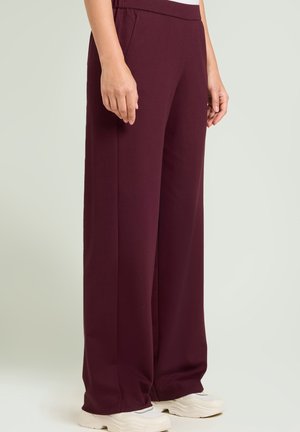 A GAMBA LARGA IN PUNTO - Pantaloni - bordeaux