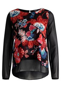 Blouse noire à manches longues avec un design en couches et des motifs floraux vibrants rouges, roses et bleus sur un tissu semi-transparent.