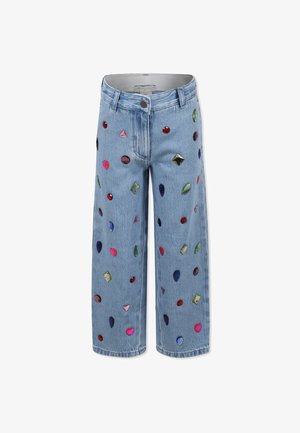 Jeans a gamba larga in denim azzurro chiaro con decorazioni colorate simili a gemme in varie forme, tra cui diamanti, cuori e triangoli.