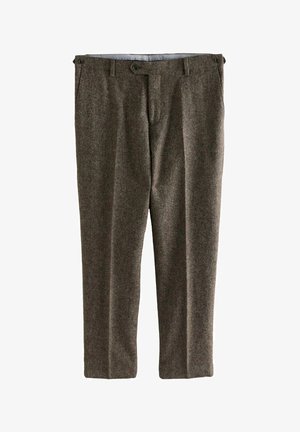 Brūnas, austas auduma bikses ar brīvu piegriezumu, kurām ir divas priekšējās kabatas, jostu cilpiņas un divi pogu aizdari jostasvietā.