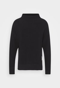 Jersey negro de punto con cuello alto, hombros caídos, textura acanalada y un detalle sutil de logotipo en el lateral. Diseño de ajuste holgado.