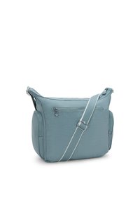 Borsa a tracolla in nylon blu con tracolla regolabile, tasche con zip e forma strutturata. Caratterizzata da una superficie testurizzata e design minimalista.