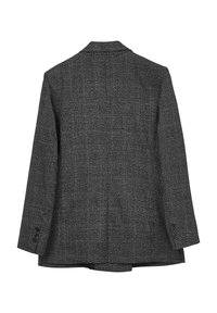 Blazer grigio a scacchi con un design strutturato, uno spacco singolo e dettagli dei polsini abbottonati, realizzato in tessuto testurizzato.