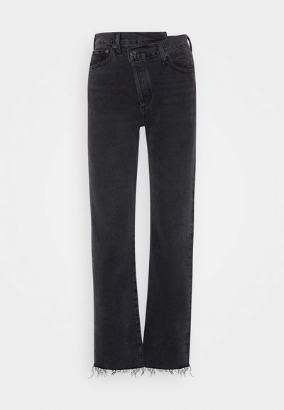 Black denim jeans with a straight-leg cut, featuring a faded finish and frayed hem details. No visible branding or patterns.