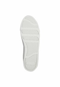 Suola di scarpe in gomma bianca con motivi di grip testurizzati, caratterizzata da un bordo liscio e segmenti definiti per trazione e flessibilità.