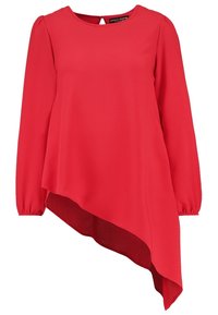 Blusa asimétrica roja con mangas largas, escote redondeado y puños elásticos. Fabricada en un tejido suave con un diseño fluido y en capas.