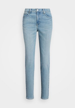 Lyseblå højtsiddende skinny jeans med front knap og lynlås, fem lommer og subtile falmede detaljer omkring hofterne.