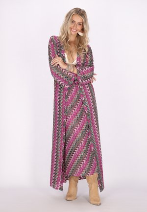 Abito lungo avvolgente multicolore con un motivo ondulato in rosa, verde e nero. Realizzato in tessuto leggero con maniche lunghe.