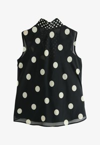 Sélectionné, black polka dot